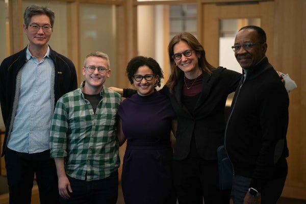 Andy Tan, David Lydon-Staley, Emily Falk, and John Jemmott with a student